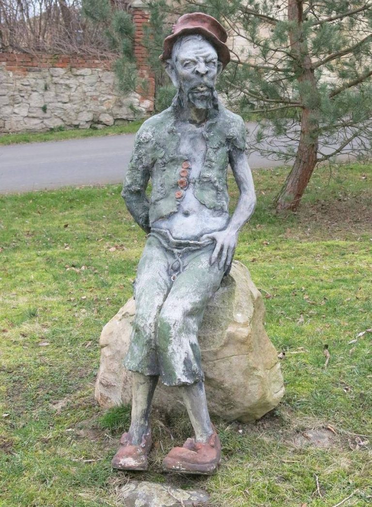 Vodník statue in Northern Bohemia. Wikimedia commons water sprite