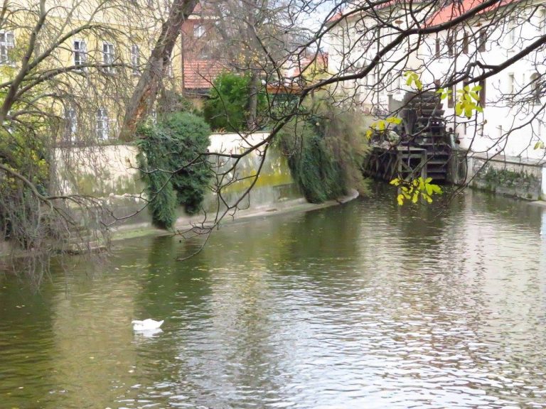Mill wheel on Čertovka water sprite