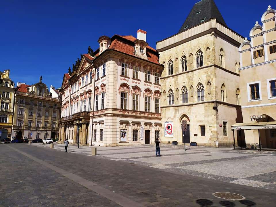 Kinský Palace extends far beyond the neighboring buildings