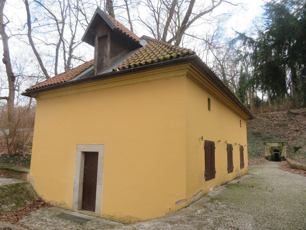 Yellow service shack next to the tunnel
